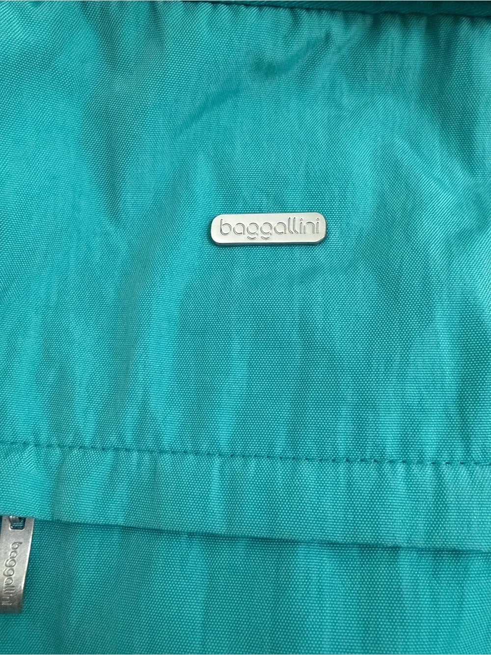 Baggallini Excursion Sling Rare Teal Color Convertible Crossbody to Backpack